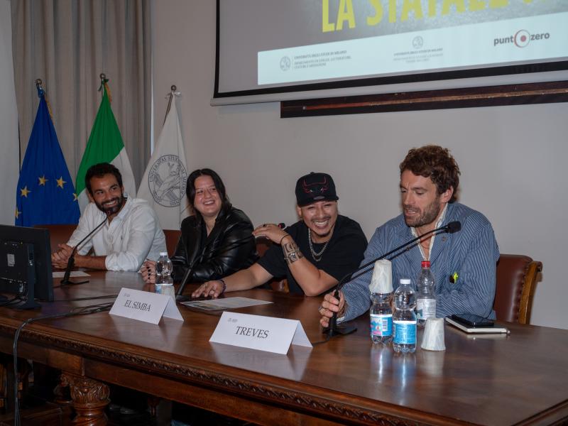 Greta Valicenti, giornalista di Billboard Italia e Alessandro Treves, fotografo, dialogano con El Simba e Francesco Castagnino, regista, che hanno realizzato il videoclip. 