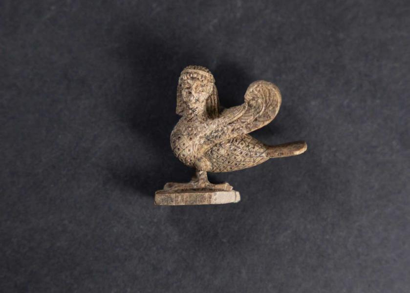 Dig Q: miniature ivory statuette of mermaid